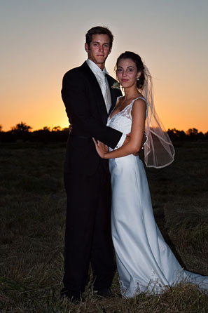 sunset portrait of bride and groom