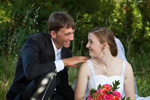 bride and groom in the grass II