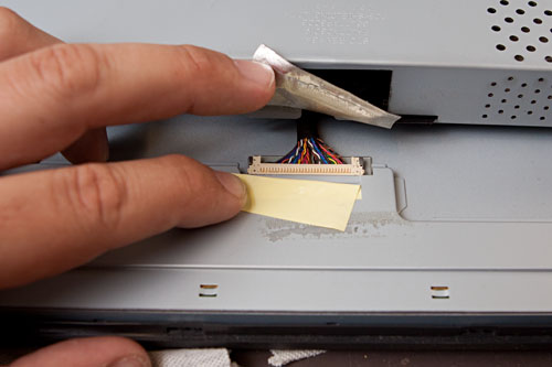 figure 8: remove the LCD data cable at the top of the screen
