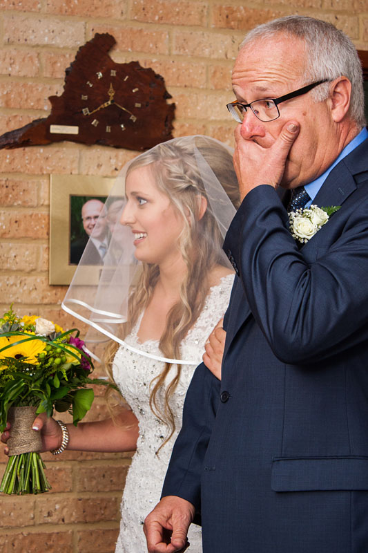 an emotional moment for the father of the bride