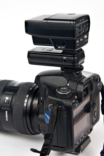 Strato transmitter on 50D body, with Canon ST-E2 on top of Strato