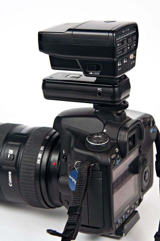 Strato transmitter on 50D body, with Canon ST-E2 on top of Strato