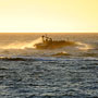 jet boat at sunset