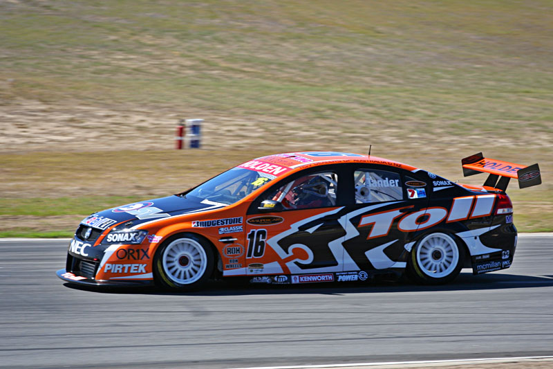 Garth Tander driving a Toll HSV VE Commodore