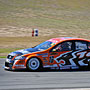 Garth Tander driving a Toll HSV VE Commodore