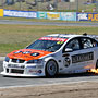 Paul Morris driving a Team Sirromet Wines VE Commodore
