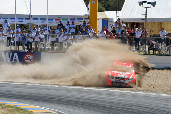 Todd Kelly sliding his HRT VE Commodore into the sand trap