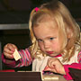 Kira concentrating on Rummikub