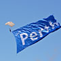 parachutist with a giant flag (Red Bull Air Race)