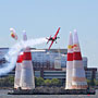 A plane hits the top of a pylon