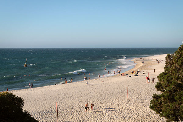 people enjoying the beach