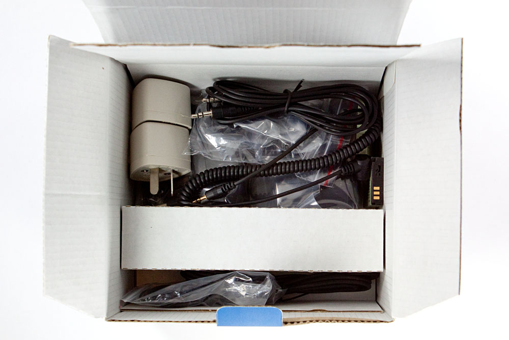 lotsa cables and accessories in the bottom of the box