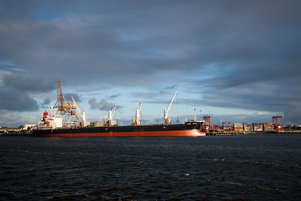 a ship being loaded with scrap metal