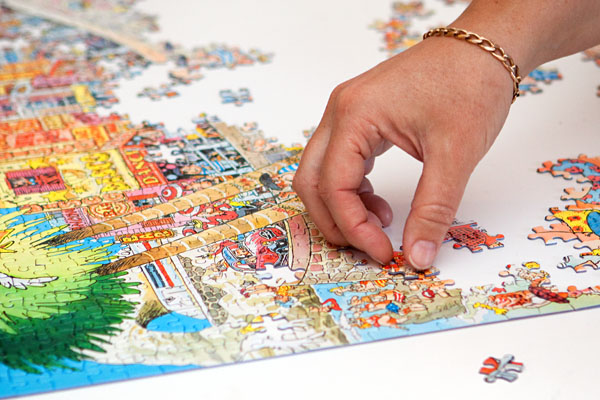 working on a jigsaw puzzle
