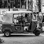 auto rickshaw driver waiting for passengers