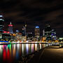 city lights, with the Spanda sculture shown at centre