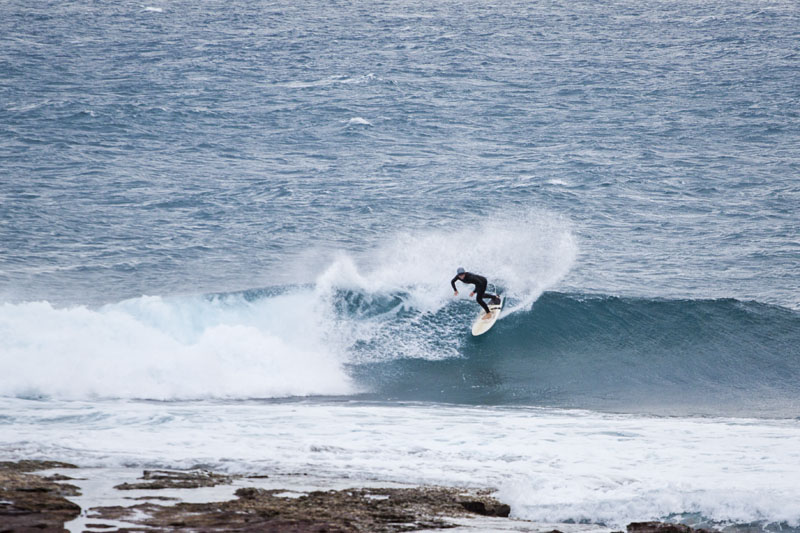 another surfer enjoying the waves