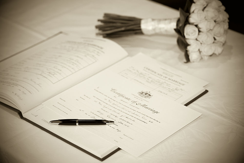 wedding certificate and bouquet